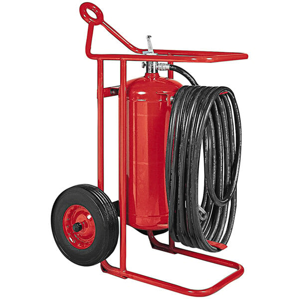 A red Badger fire extinguisher on a cart.