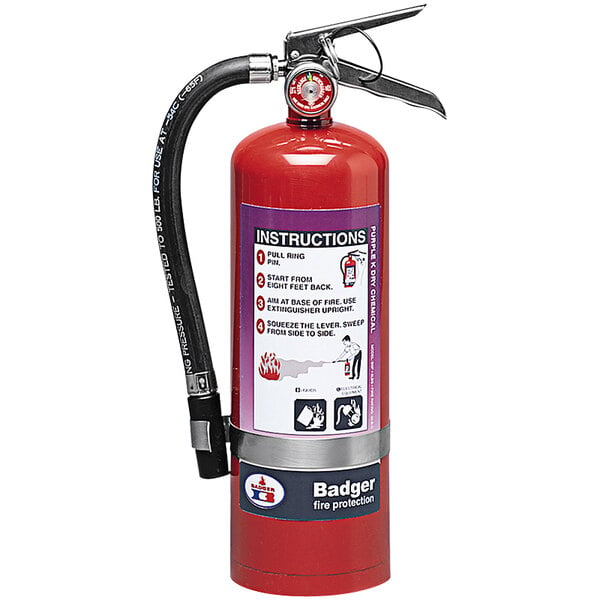 A red Badger fire extinguisher with a black hose.