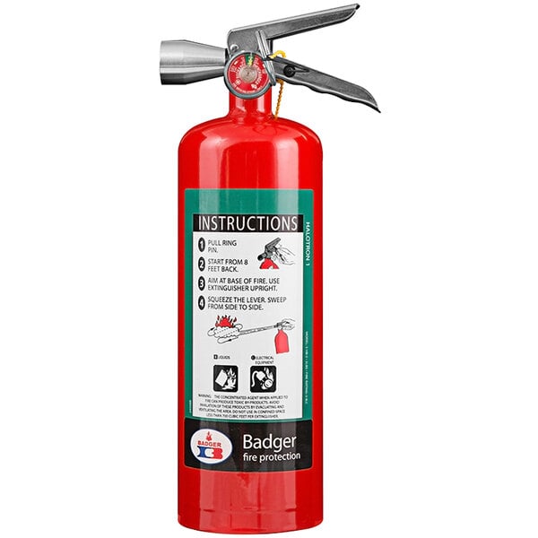 A Badger Extra Halotron-1 fire extinguisher with a red and white label and wall hook.