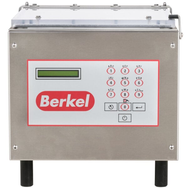 A Berkel Chamber Vacuum Packaging Machine with a glass top and buttons.