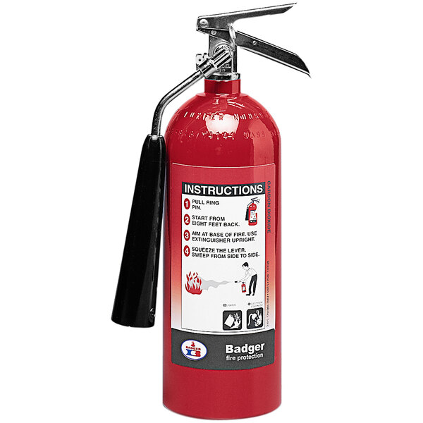 A red Badger fire extinguisher with a black handle.