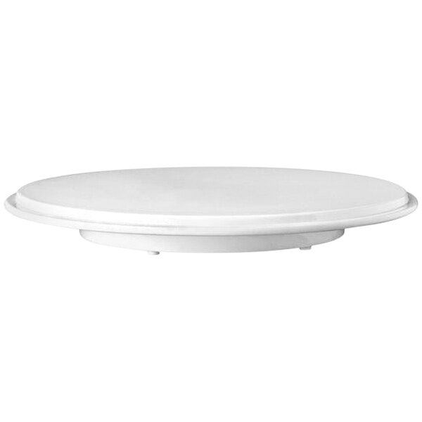 A white round melamine cake plate with lid.