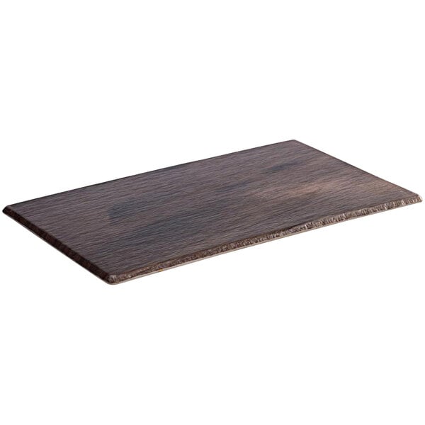 An APS oak melamine serving tray on a rectangular wooden surface.