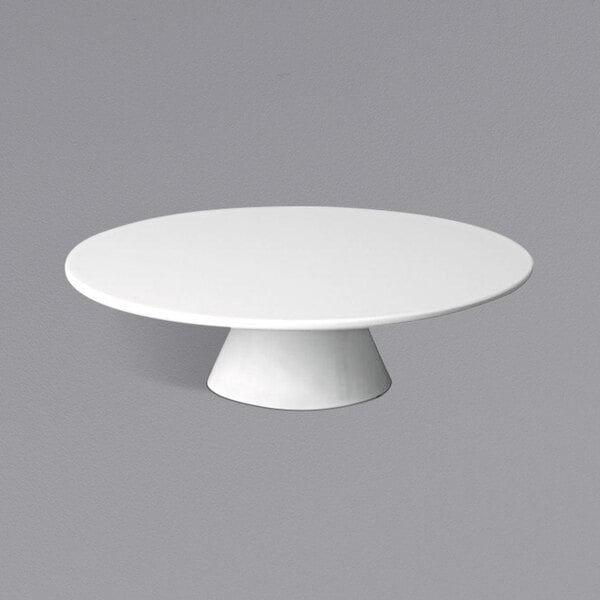 A white round APS Casual melamine cake stand with a white base.