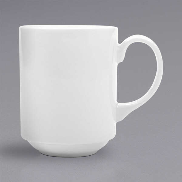 A bright white porcelain tea mug with a handle.