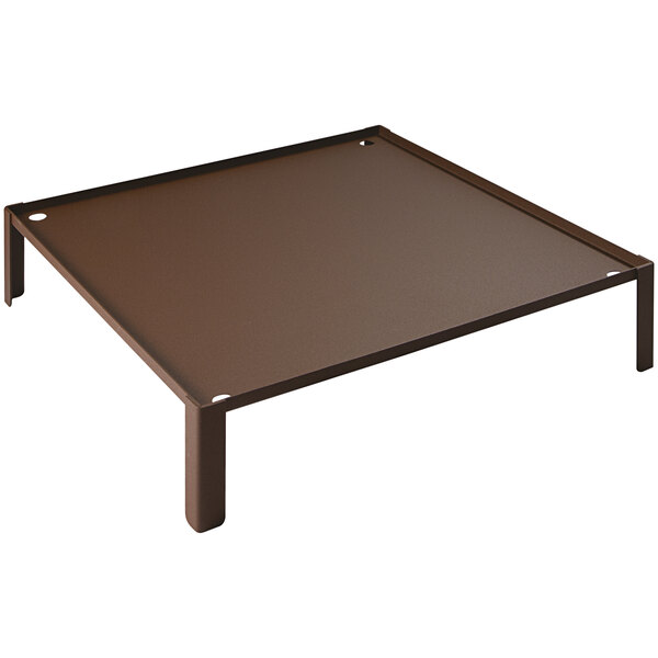 A brown metal table with a copper metal base with legs and a square metal tray on top.