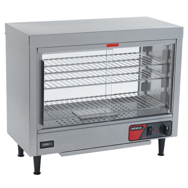 A Nemco heated display case with a glass door.