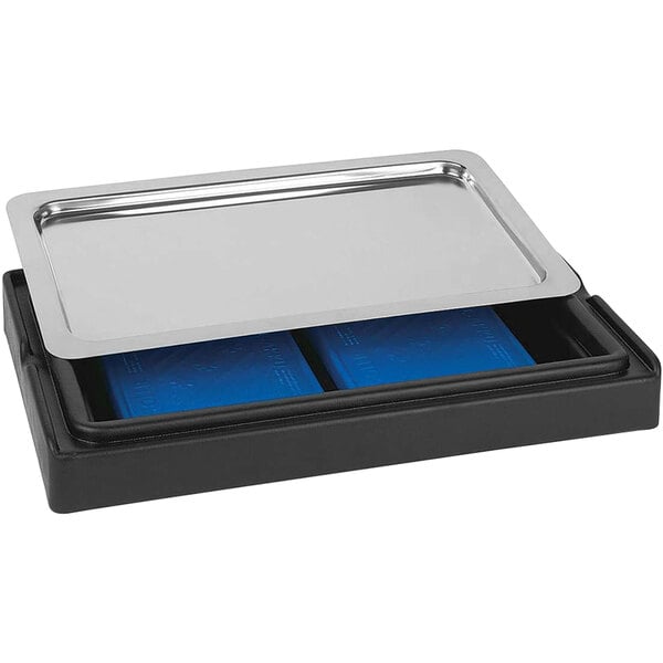 A black tray with rectangular blue trays inside on a counter.