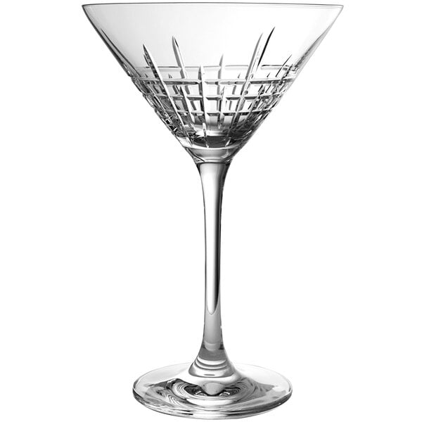A close-up of a clear Schott Zwiesel martini glass with a patterned design.
