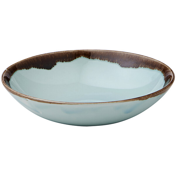 A Dudson turquoise coupe china bowl with a brown rim.