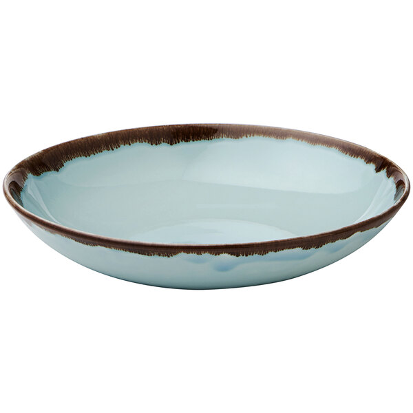 A turquoise bowl with a brown border.