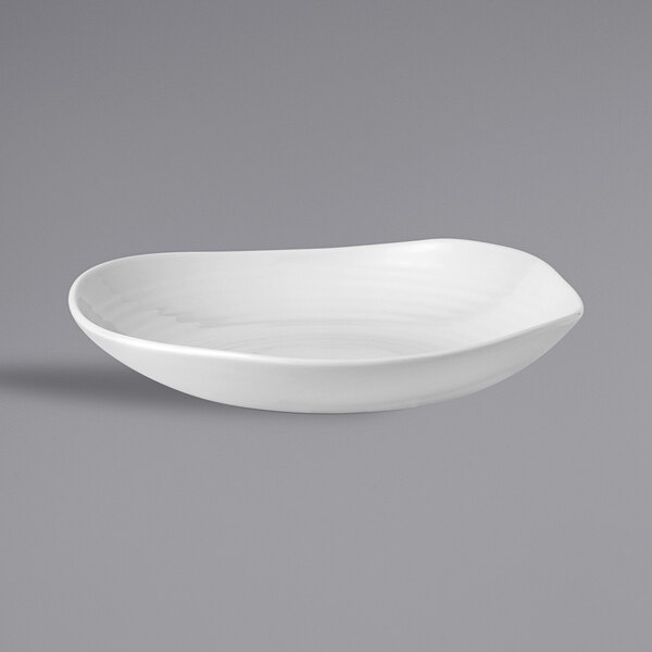 A Dudson Organic White china bowl with a curved edge on a gray background.