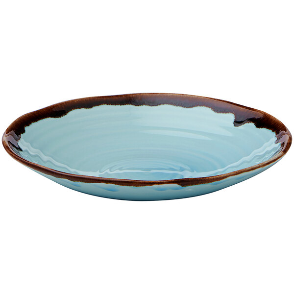 A turquoise coupe bowl with a brown band on the rim.