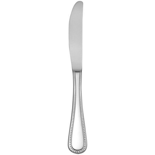A Oneida Pearl stainless steel table knife with a handle.