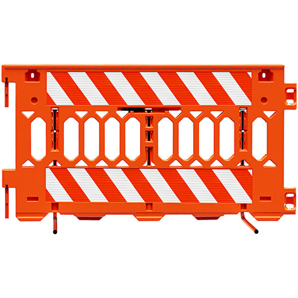 An orange Plasticade barricade with white stripes on both sides.