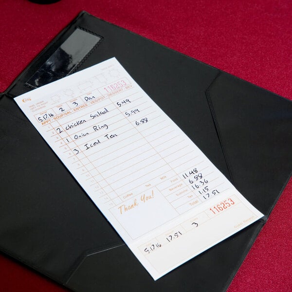 A Choice tan and white carbonless guest check with beverage lines and bottom guest receipt on a black folder.