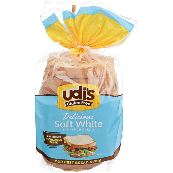 A blue and yellow bag of Udi's Gluten-Free Soft White Sandwich Bread.