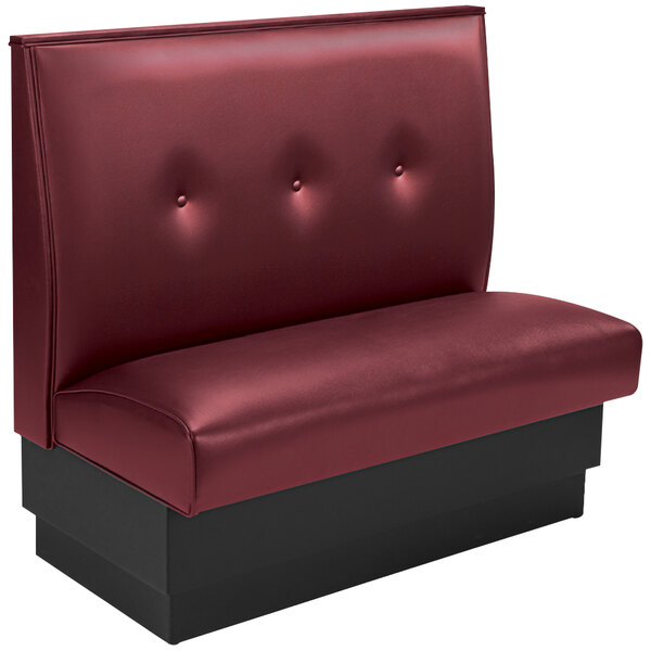 An American Tables & Seating red upholstered single booth with 3-button tufted back and black end caps.