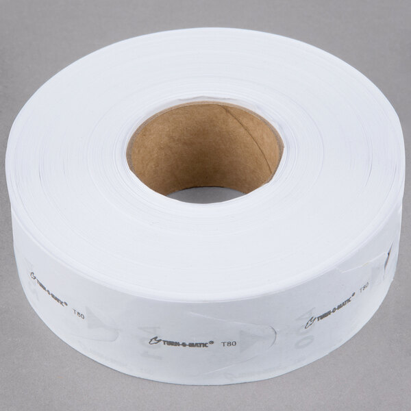 A roll of white paper with a hole in the middle.