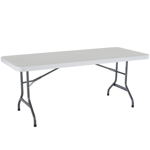 A white rectangular Lifetime folding table with metal legs.