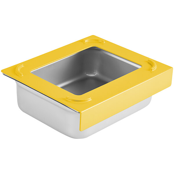 A yellow Pan Stacker for stainless steel pans on a counter.