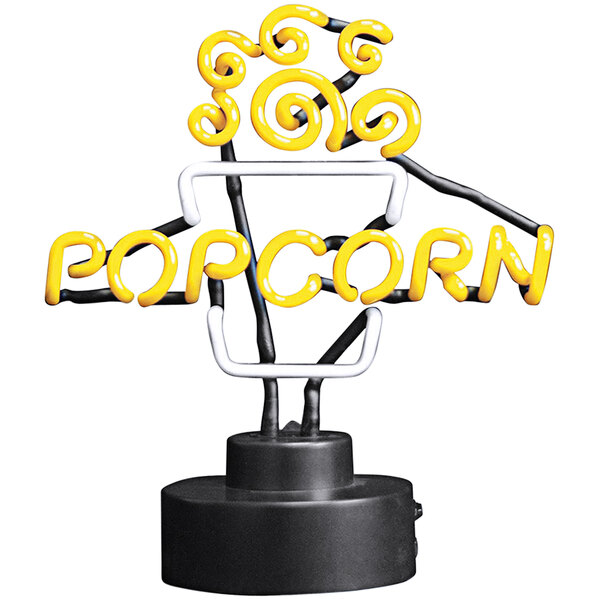 A white neon sign that says "popcorn" in yellow.