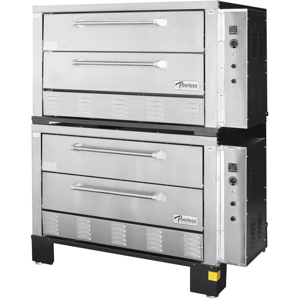 A large stainless steel Peerless electric quadruple deck pizza oven with side controls.