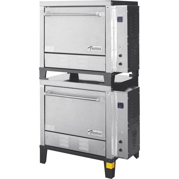 A stainless steel Peerless countertop double deck pizza oven with side controls.