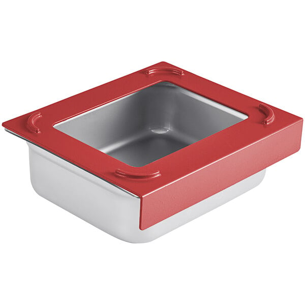 A red Pan Stacker holding a stainless steel hotel pan on a counter.