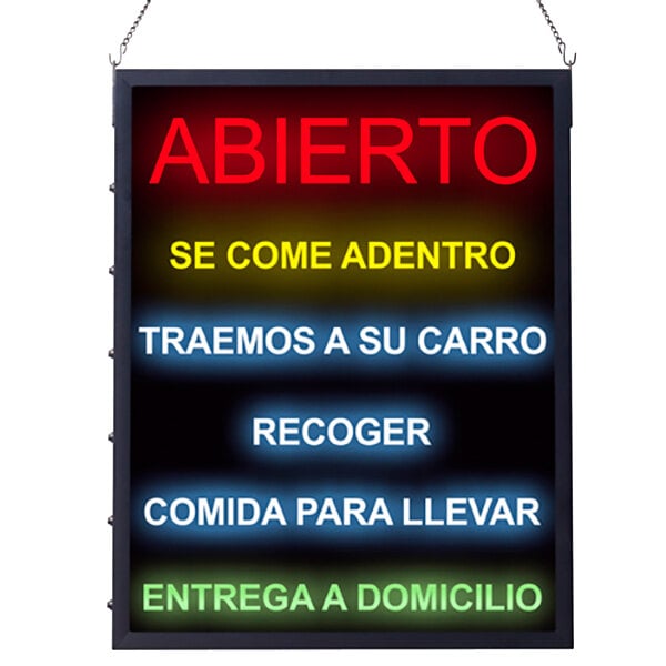 A rectangular LED sign with white text on a black background and colorful letters that says "Abierto" in yellow and "Cerrado" in green.