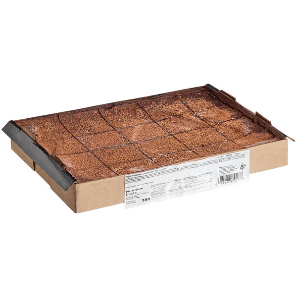 A brownie in a box with Eli's Cheesecake packaging.