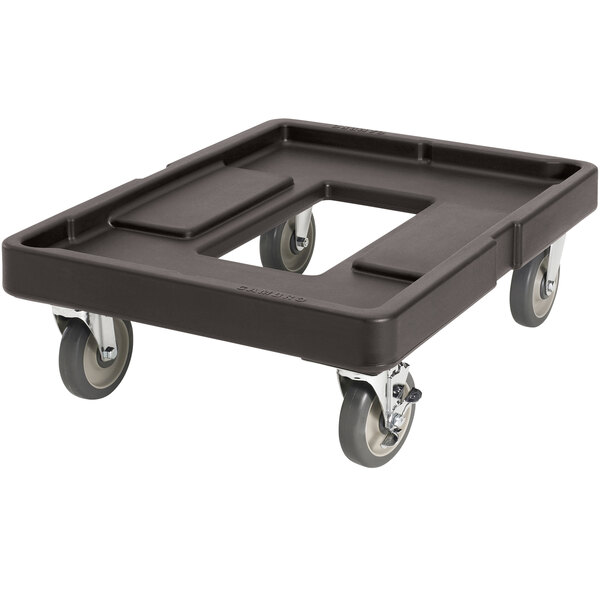 A charcoal gray plastic Cambro milk crate dolly with wheels.