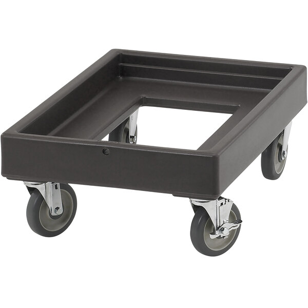 A charcoal gray plastic dolly with wheels for Cambro containers.