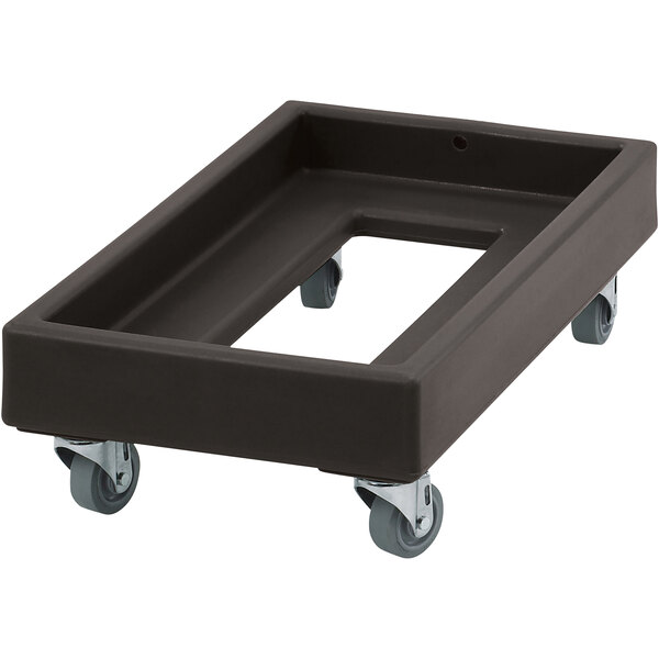 A black plastic dolly with wheels for a Cambro milk crate.
