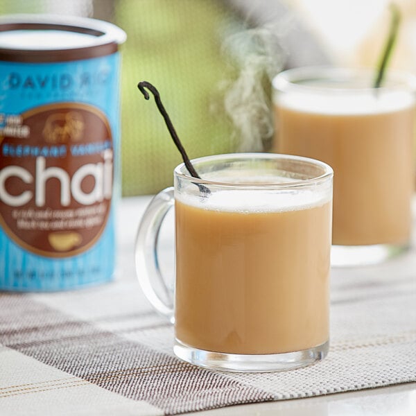 A glass mug of David Rio Elephant Vanilla Chai Tea Latte.