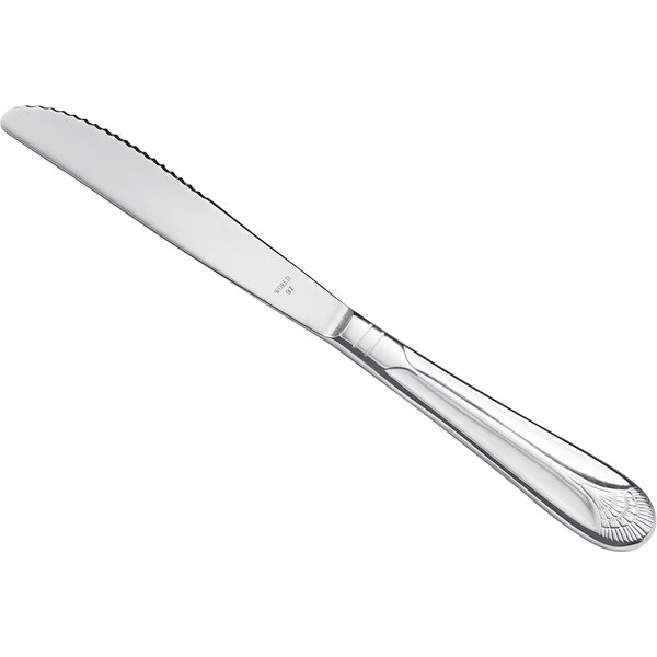 A Libbey stainless steel dinner knife with fluted blade and hollow handle.