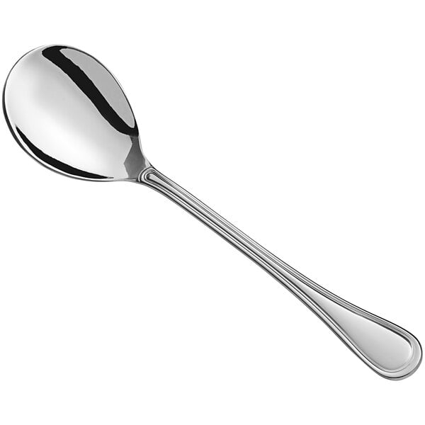 A Libbey stainless steel serving spoon with a silver handle and spoon.