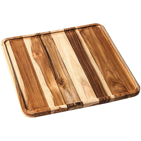 A Teakwood serving tray with stripes on the bottom.