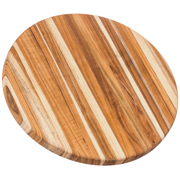 A Teakhaus teakwood cutting board with stripes.