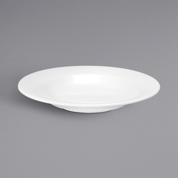 A cream white porcelain bowl with a rim.