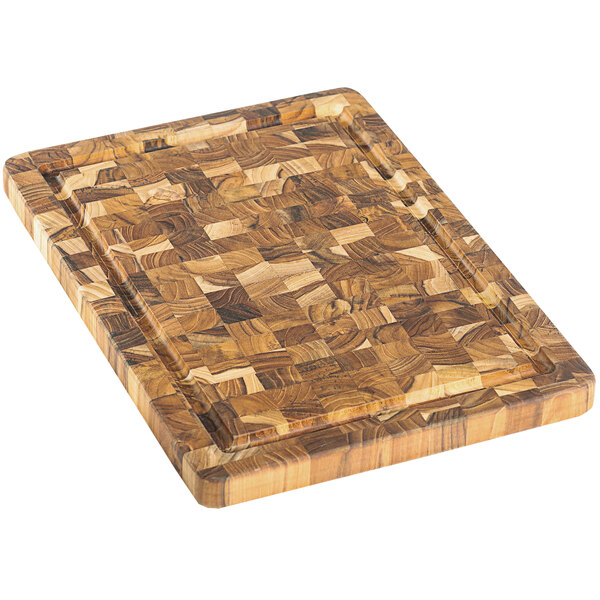 A Teakhaus end grain teakwood cutting board with a wooden pattern.