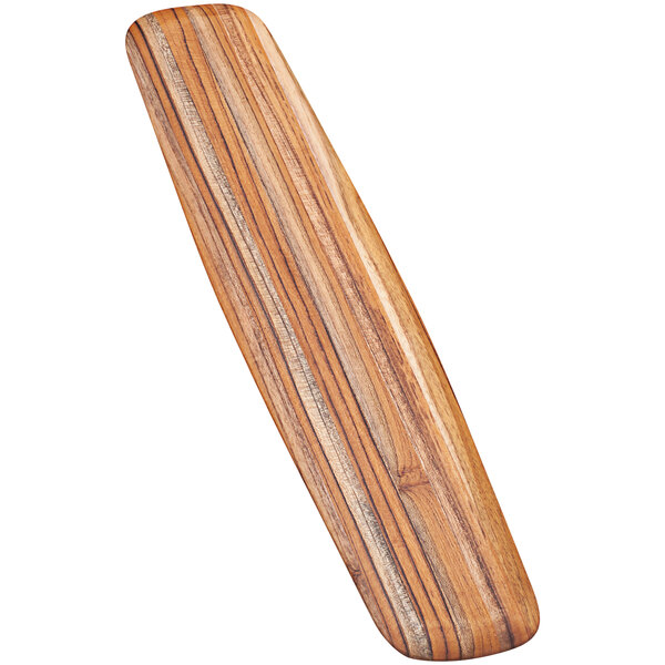 A Teakhaus teakwood long serving board with a rounded edge.