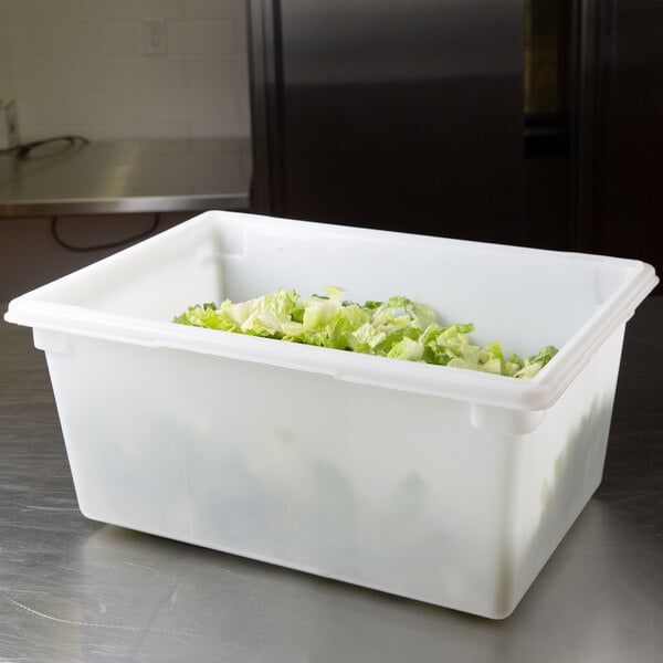 A white Rubbermaid polyethylene food storage box filled with lettuce.