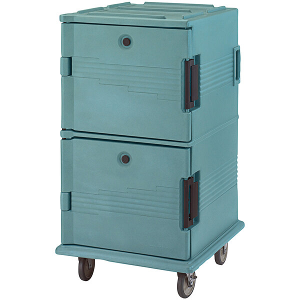 A blue Cambro insulated food pan carrier with casters and brown handles.