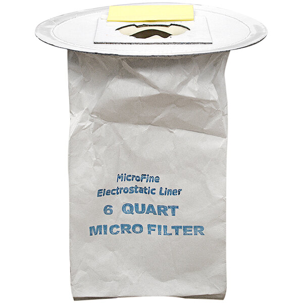 A white Delfin disposable filter bag with a hole in it.