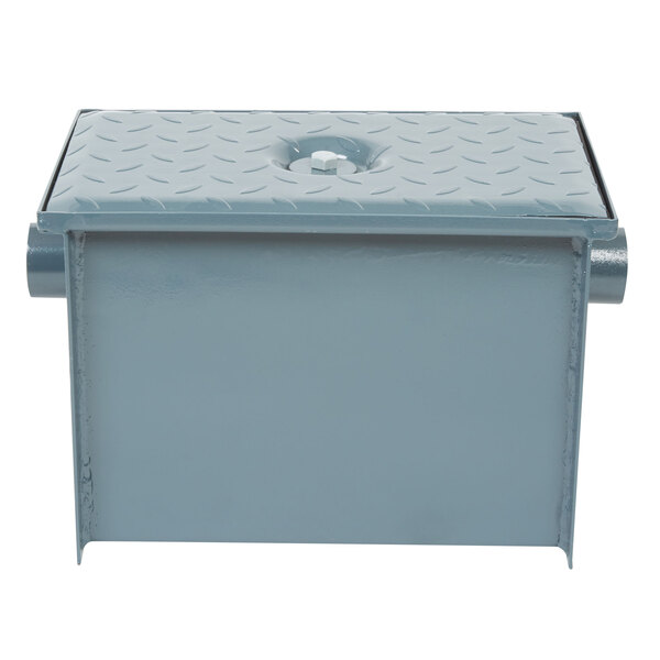 A grey metal Watts WD-4 Grease Trap with a bolted lid.
