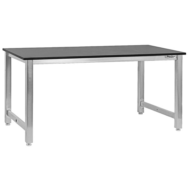 A black and silver BenchPro Kennedy Series workbench with a stainless steel frame and phenolic resin top.