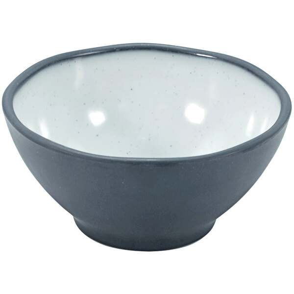 A Dalebrook steel blue melamine bowl with a speckled white rim.