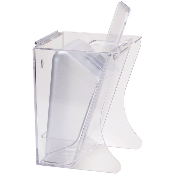 A clear plastic scoop holder with a lid containing a scoop and drip tray.