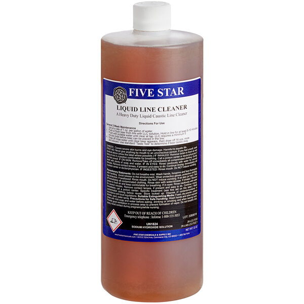 A bottle of Five Star low-foaming brewery liquid line cleaner with a label.